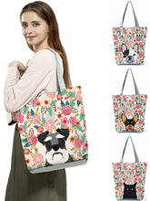 Load image into Gallery viewer, Image of a lady carrying Schnauzer handbag in a most adorable Schnauzer in bloom design