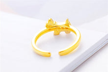 Load image into Gallery viewer, Back image of a gold Scottie dog jewelry ring in sparkling white-stone studded Scottish Terrier design