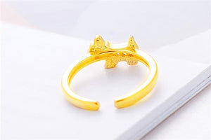 Back image of a gold Scottie dog jewelry ring in sparkling white-stone studded Scottish Terrier design