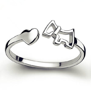 Image of a silver Scottie dog ring in Scottish Terrier and heart design on white background