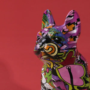 Close up mage of an artistic and colorful french bulldog statue