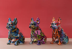 Image of three artistic french bulldog statues in three unique color blends