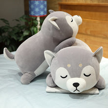 Load image into Gallery viewer, Image of two sleeping Husky stuffed animal plush toy pillows in different sizes kept on the bed