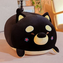 Load image into Gallery viewer, Image of a black color sleeping Shiba Inu stuffed animal plush toy pillow kept on the bed