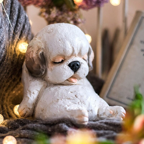 Image of a cutest sleeping Shih Tzu garden statue