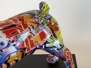 Close image of a multicolor frenchie statue