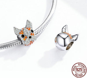 Image of an orange color stone studded sterling silver boston terrier charm
