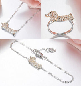 Image of a beautiful silver stone studded Dachshund jewelry set including ring, bracelet and necklace