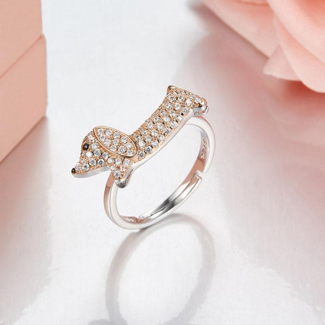 Image of a beautiful studded Dachshund ring in the shape of a Dachshund made of 925 Sterling Silver