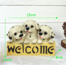 Load image into Gallery viewer, image of three dalmatians in a dog welcome staue