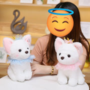 A girl playing with two white Chihuahua stuffed animal plush toys in pink and blu costumes