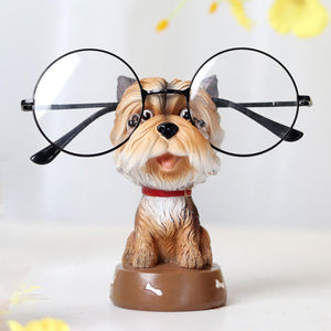 Image of a super cute and smiling Yorkie glasses holder made of resin