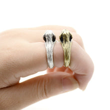 Load image into Gallery viewer, Back image of two Beagle rings on the finger of a person in the color Silver and Bronze