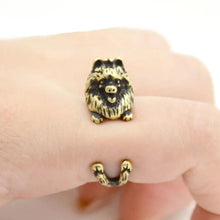 Load image into Gallery viewer, Image of a Pomeranian ring in bronze