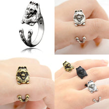 Load image into Gallery viewer, Image of three Pomeranian rings in silver, black, and bronze