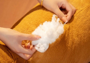 image of the material used to stuff the corgi stuffed animal plush toy pillow