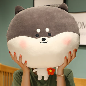 Image of a woman holding an adorable husky plush toy stuffed pillow