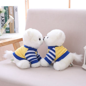 image of two adorable pomeranian stuffed animal plush toys kissing each other