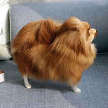 Load image into Gallery viewer, image of an adorable brown Pomeranian stuffed animal plush toy standing on a couch - sideview