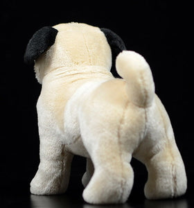 image of an adorable pug stuffed animal plush toy standing in black background - backview
