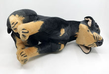 Load image into Gallery viewer, image of an adorable rottweiler stuffed animal plush toy on a table-hindview