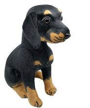 Load image into Gallery viewer, image of an adorable rottweiler stuffed animal plush toy on a table