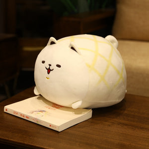 image of a samoyed Stuffed Animal pillow laying on the table.