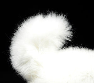 image of an adorable white samoyed stuffed animal plush toy in black background - tail