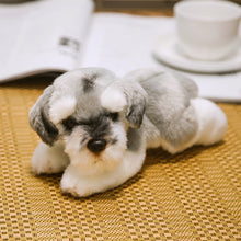 Load image into Gallery viewer, image of an adorable schnauzer stuffed animal plush toy sitting on a mat