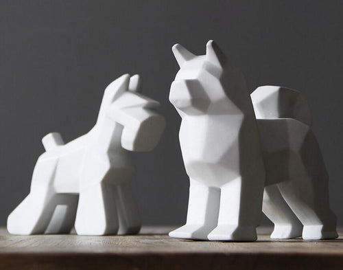 Image of two stunning white abstract Schnauzer and Samoyed statues made of ceramic