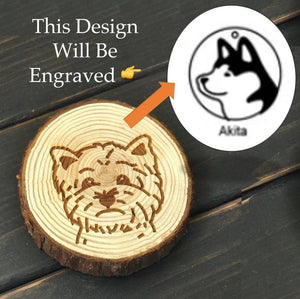 Image of a wood-engraved Akita coaster design
