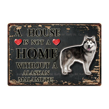 Load image into Gallery viewer, Image of an Alaskan Malamute Signboard with a text &#39;A House Is Not A Home Without A Alaskan Malamute&#39; on a dark background