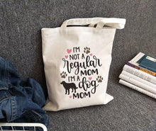 Load image into Gallery viewer, All You Need Is Love and A Dog Canvas Tote BagsAccessoriesI’m not a regular mom. I’m a dog mom