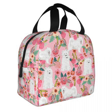 Load image into Gallery viewer, Image of an insulated American Eskimo Dog bag with exterior pocket in bloom design