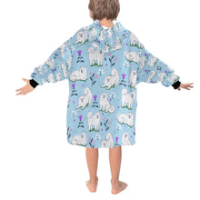 Load image into Gallery viewer, Image of a girl wearing an American Eskimo Dog blanket hoodie for kids in light blue color - Back View