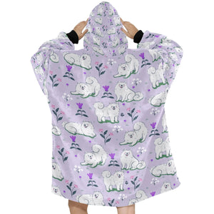 Image of a lady wearing an American Eskimo Dog blanket hoodie for women in lavender color - Back View