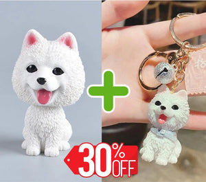 Image of a smiling American Eskimo Dog bobblehead and American Eskimo Dog keychain bundle
