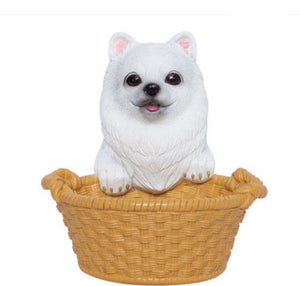 Image of a super cute American Eskimo Dog Christmas ornament in the most helpful American Eskimo Dog holding a basket design