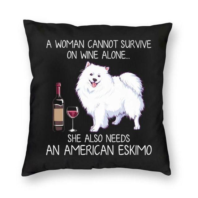 Image of an American Eskimo Dog cushion cover in a super cute Wine and American Eskimo Dog design with a text 'A Woman Cannot Survive On Wine Alone, She Also Needs An American Eskimo