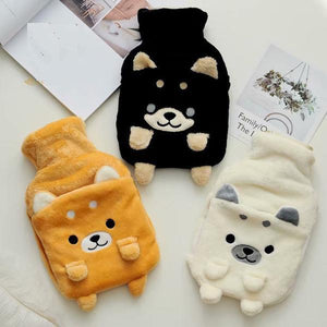 Image of an orange, black, and white color American Eskimo Dog Hot Water Bottle Plush Hand Warmers
