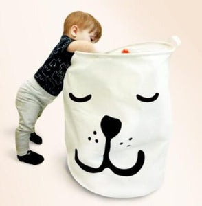 Image of an adorable American Eskimo Dog laundry basket in smiling American Eskimo Dog design with eyelashes going down
