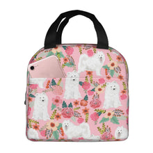 Load image into Gallery viewer, Front image of an insulated American Eskimo Dog in bloom design American Eskimo Dog lunch bag with exterior pocket