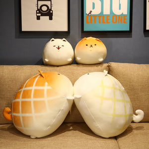 Image of four adorable bread loaf American Eskimo Dog stuffed animal plush pillows