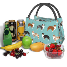 Load image into Gallery viewer, Image of an Australian Shepherd lunch bag with high-quality holding straps, zip closure, three-layer insulation, and the cutest Australian Shepherds in all colors design