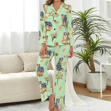 Load image into Gallery viewer, image of a woman wearing a green pajamas set with autumn leaves design