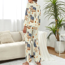 Load image into Gallery viewer, image of a woman wearing a beige pajamas set with autumn leaves design - back view