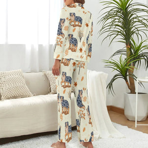 image of a woman wearing a beige pajamas set with autumn leaves design - back view