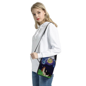 Image of a lady wearing a basset hound messenger bag