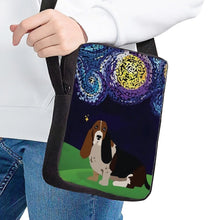 Load image into Gallery viewer, Image of a lady holding a basset hound messenger bag