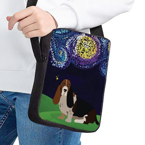 Image of a lady holding a basset hound messenger bag